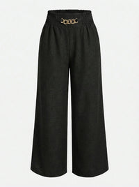 Palacio | Pantalones con detalle Dorado
